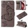 Mobigear Butterfly Housse iPhone 16 Pro Etui Porte-Monnaie - Gris