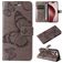 Mobigear Butterfly iPhone 16 Pro Étui Portefeuille - Gris